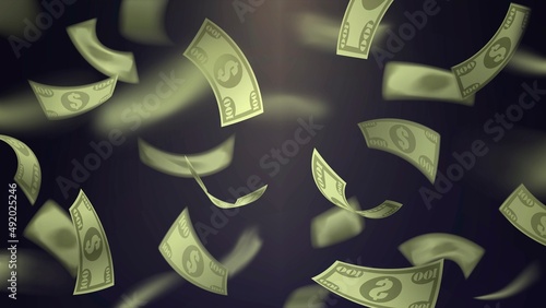 Falling one hundred dollar bills on dark background with blur effect