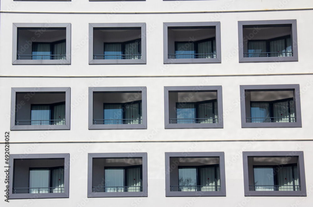 Fototapeta premium windows of a building , hotel balcony