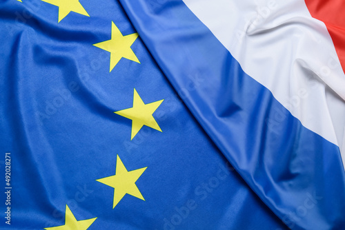 Flags of European Union and France as background, closeup