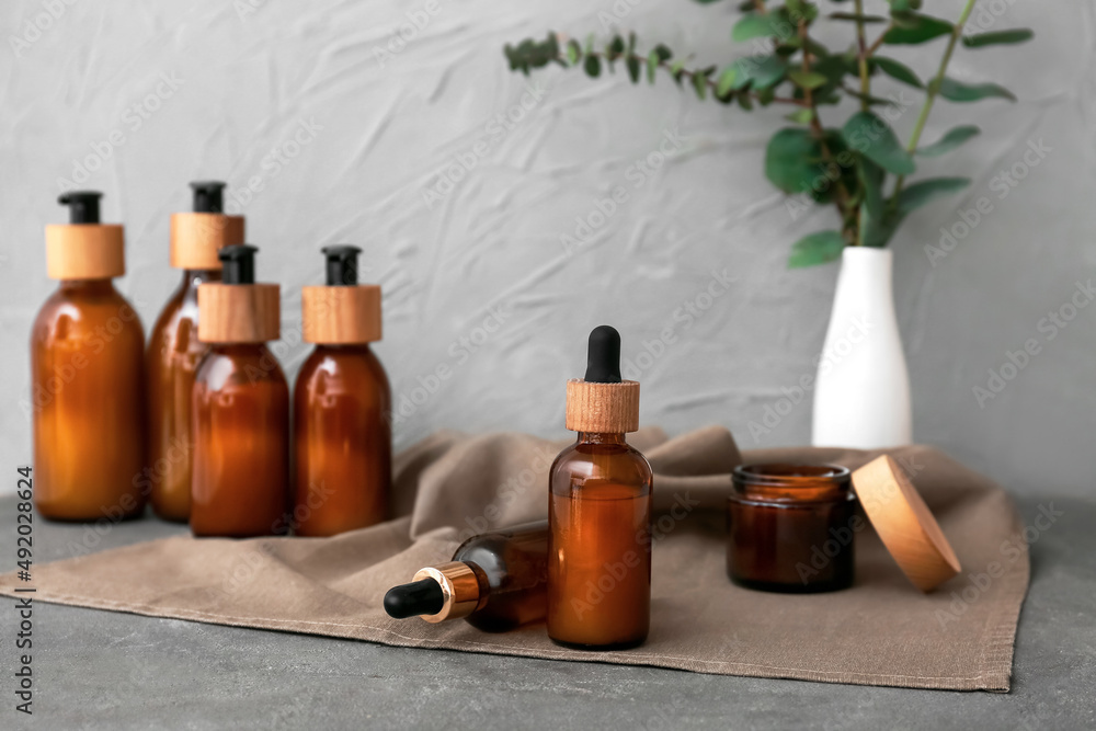 Set of natural cosmetics on grunge background Set of natural cosmetics on grunge background