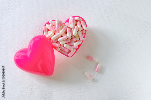 pink medicine in pink container