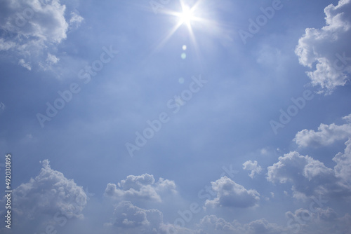 Cloud and sun in blue sky