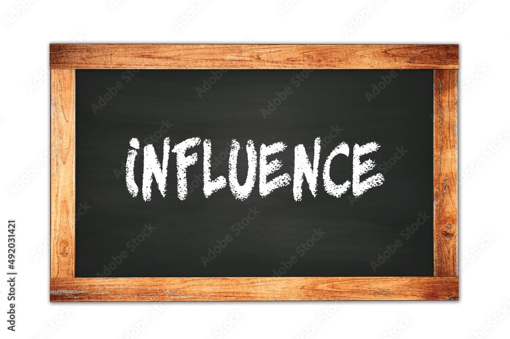 INFLUENCE text written on wooden frame school blackboard. INFLUENCE text written on wooden frame school blackboard.