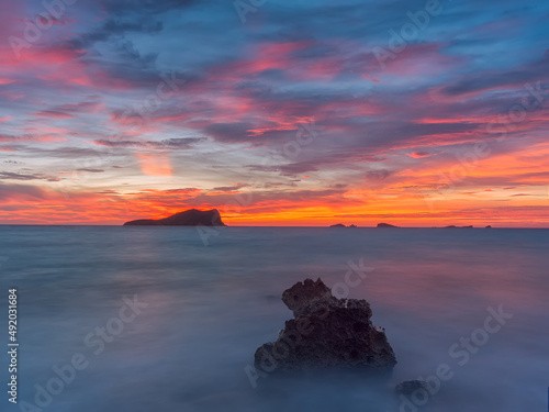 Ibiza red sunset by the sea , Cala Conta © Anton