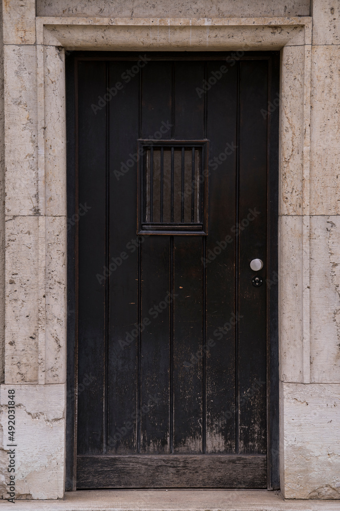 Munich, Germany - December 20,2021: Old Decorative Main Entrance Wooden Door. Munich, Germany - December 20,2021: Old Decorative Main Entrance Wooden Door.