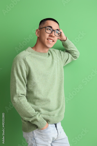 Handsome young Asian man in...