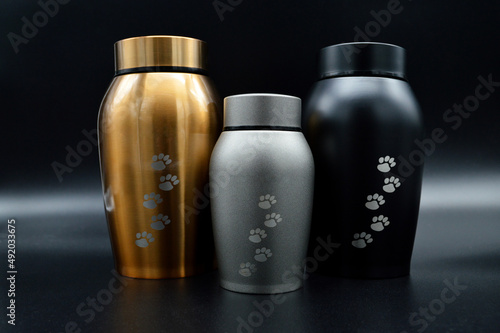 Pet urns for cremation or burial. Funeral urns.	 photo