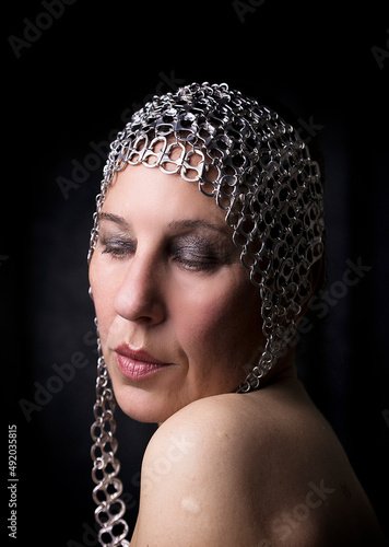 portrait of woman with metal cap IX