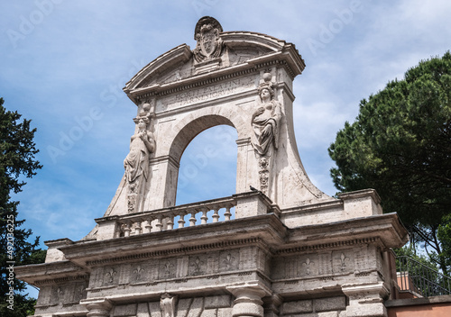 Palatine Hill main entrance gate arch in Rome, Italy. Horti Palatini Parnesiorum.