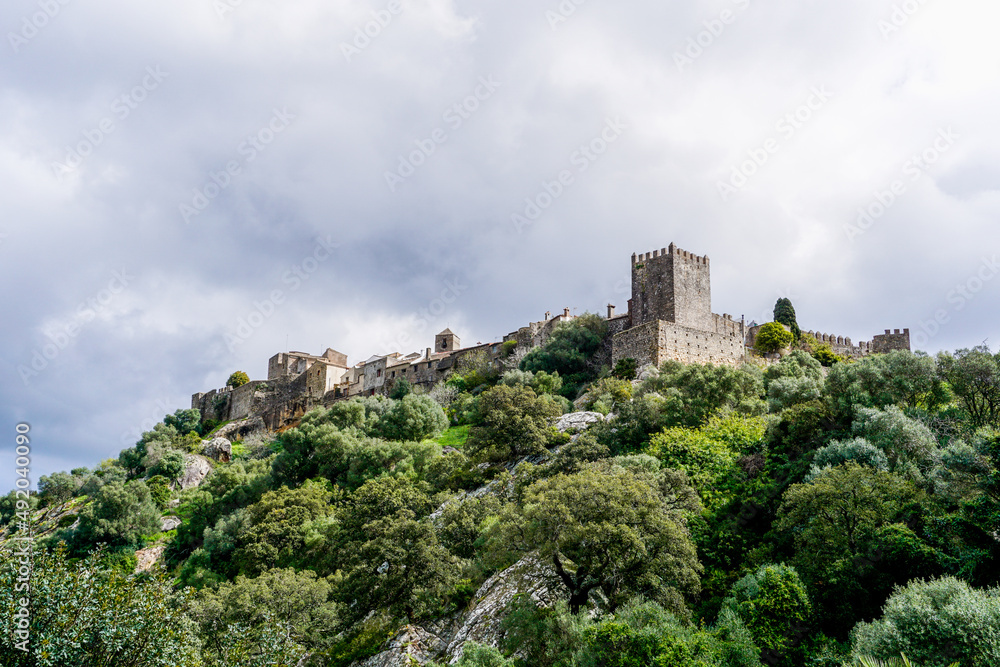 view of the castle of Castellar de la Frontera under an overcast expressive sky