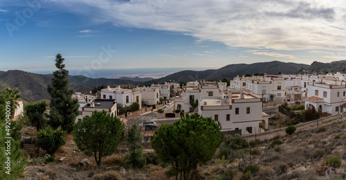 view of the idyllic whitewashed Andalusian village of Enix in the backcountry of Almeria Province photo