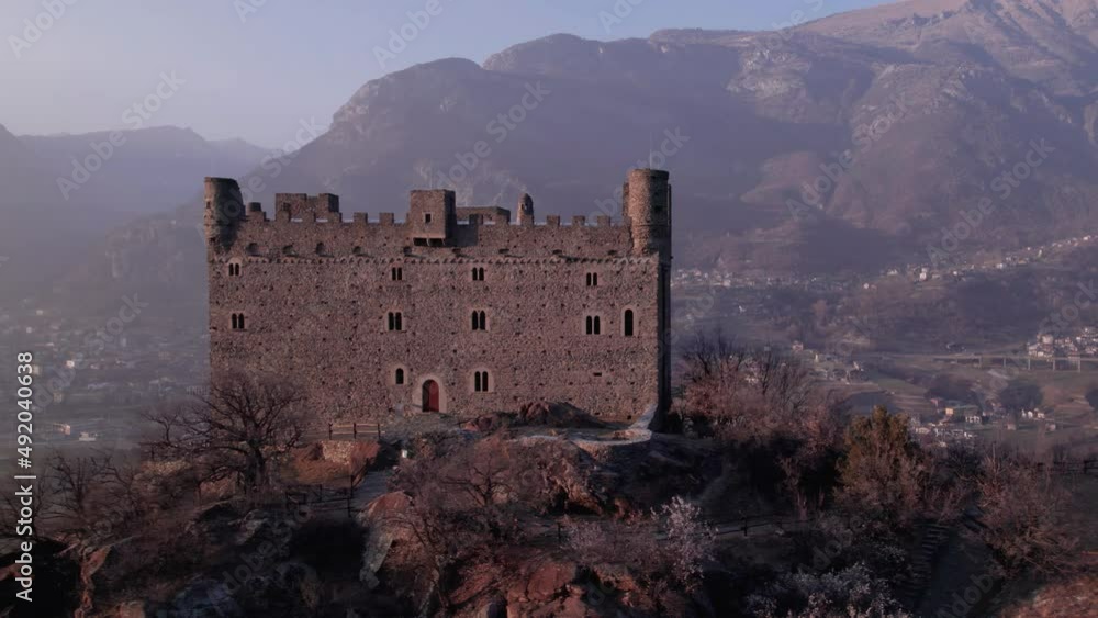 Aerial slide view of Ussel Castle facade in Aosta Valley in the Alps. Aerial slide view of Ussel Castle facade in Aosta Valley in the Alps.