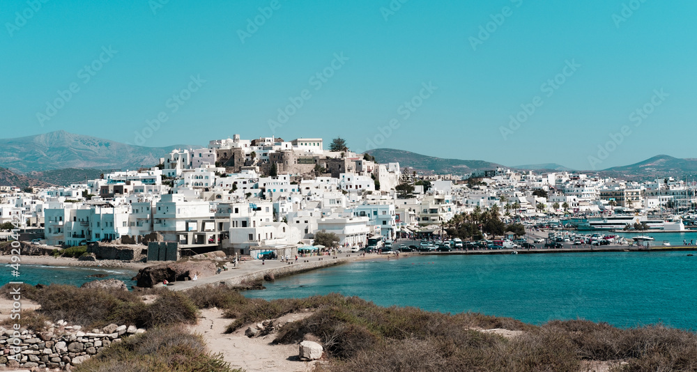 Chora town in Naxos Island view from portara inlet, white greek architecture, sea scape, town scape