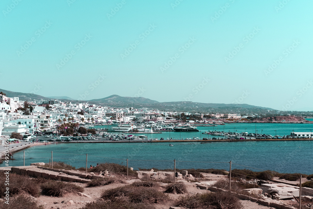 Naxos harbour view with sailing boats at anchor, island yachting, travel, summer cultural tour concept