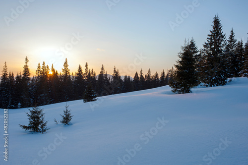 sunrise in the winter mountains on a sunny day
