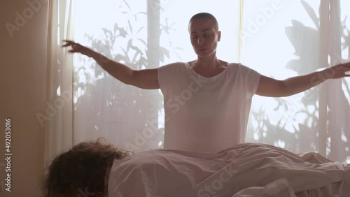 Professional therapist tantra massage master energy touching patient body. Peaceful Energy flowing through the body and soul.