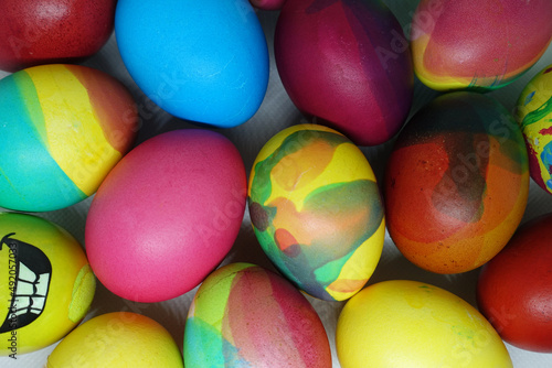 Colorful easter eggs close up. Painted vibrant decorative eggs