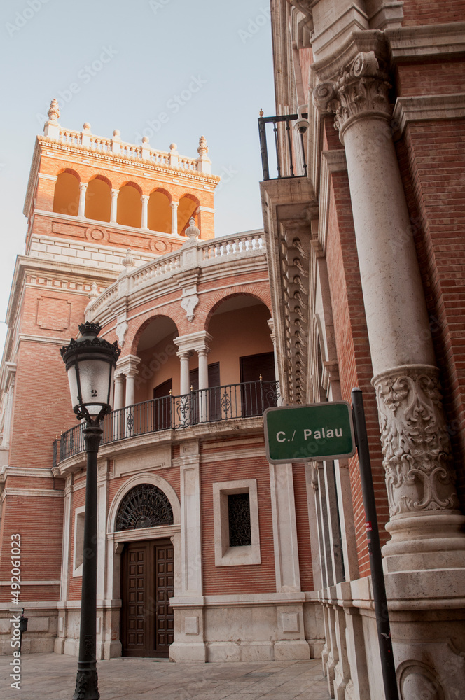 Obraz premium Carrer del Palau, Valencia. Facade of archbishop's palace. Street. Historic 