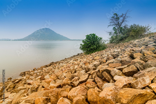 Baranti or Baronti water dam - view with blue sky in the background and rocks in foreground, Purulia - West Bengal, India photo