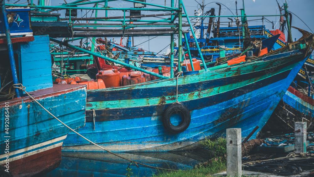 Ships are docked at the port city of Tegal, Central Java, on the morning of March 2, 2022.