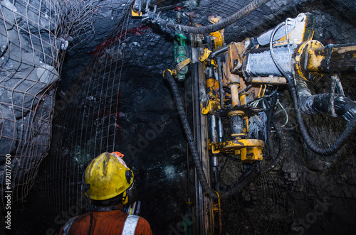 Canvastavla Mining operator on mining machine, underground mine mesh.