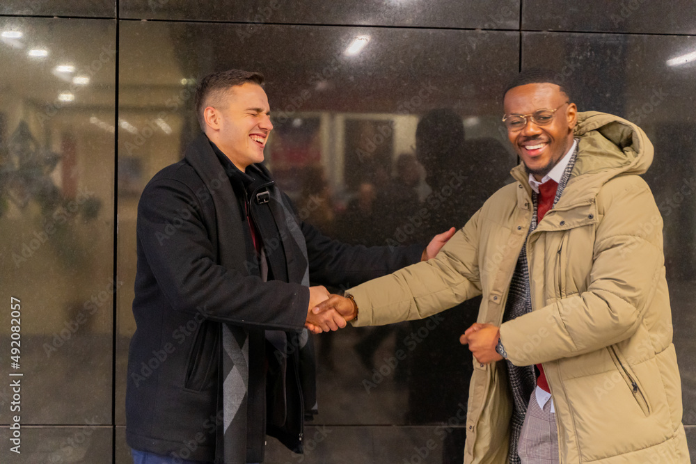 Hand shake while laughing