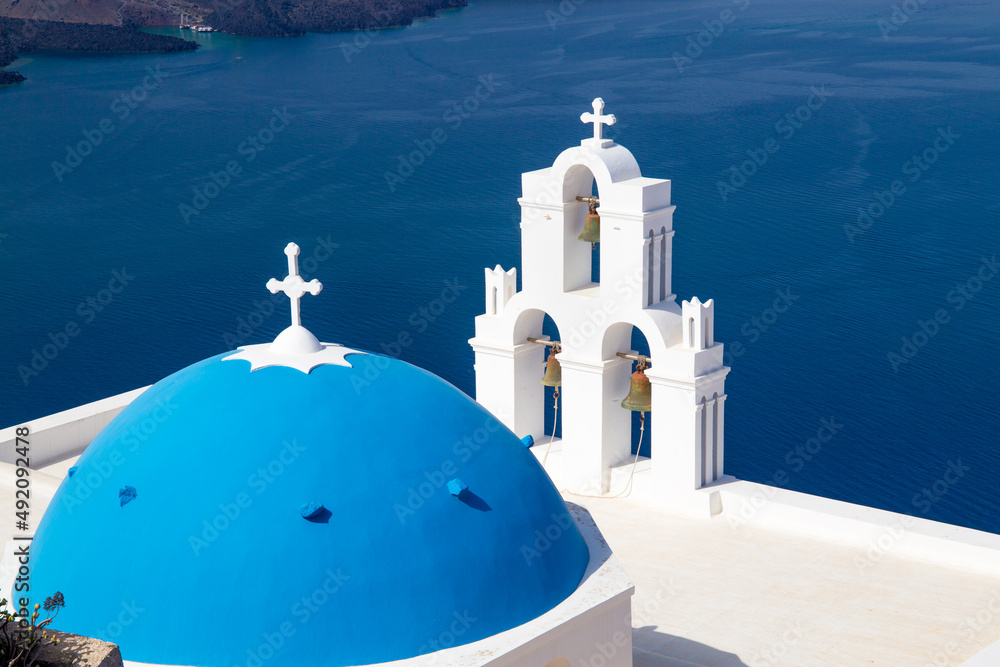 Three Bells of Fira with blue domed church, Santorini island, Greece - obrazy, fototapety, plakaty 