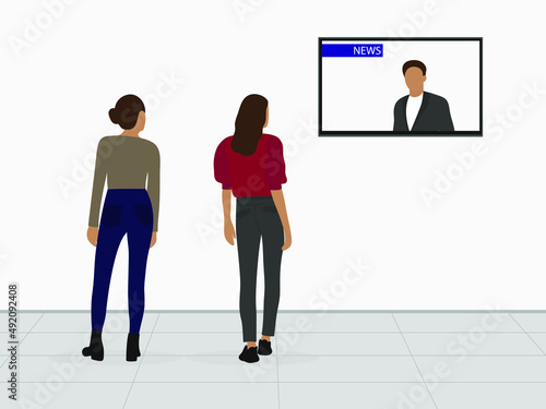 Two female characters watching news on TV hanging on the wall