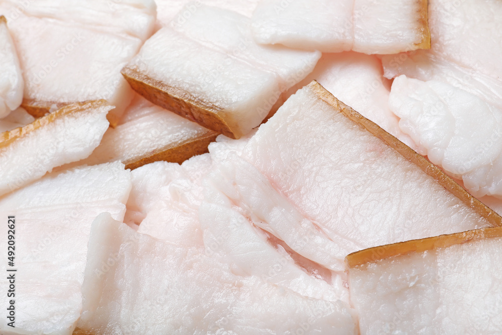 Pieces of tasty salt pork as background, closeup Pieces of tasty salt pork as background, closeup