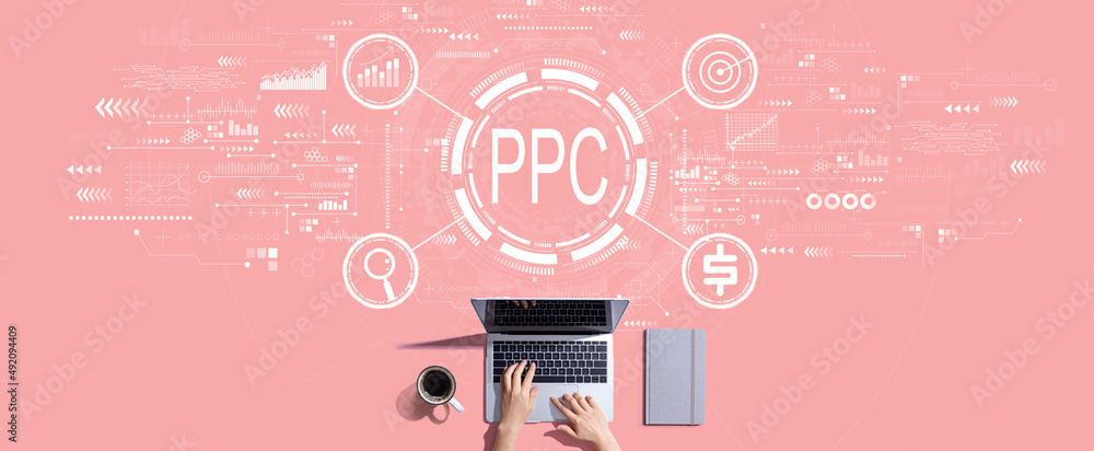 PPC - Pay per click concept with person working with a laptop
