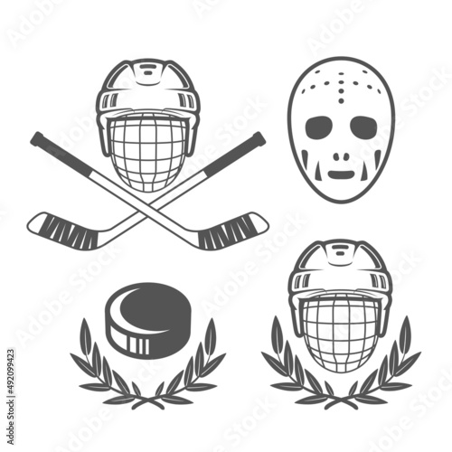 Ice hockey insignias, hockey helmet and retro goalkeeper mask, hockey puck logos, vector