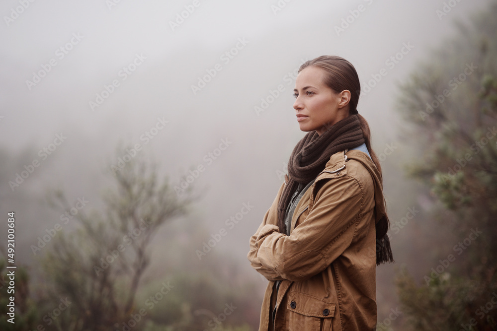 Musings in the mist. An attractive young woman out for a walk in the mountains. Musings in the mist. An attractive young woman out for a walk in the mountains.