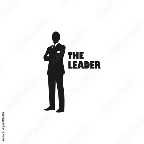 Standing business man in suit. Leadership vector silhouette illustration concept.