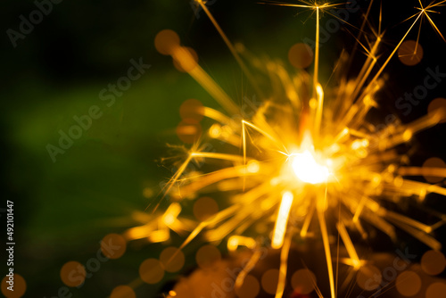 Halloween witch sparks background Fire burning particles on a black background Abstract dark glittering particle lights.