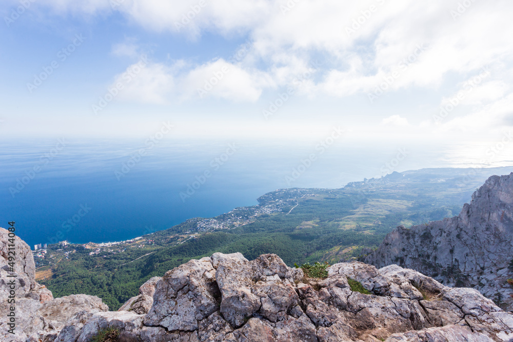 Naklejka premium Panoramic view of the city of Yalta from the Ai-Petri cliff. Crimean nature. The Republic of Crimea.