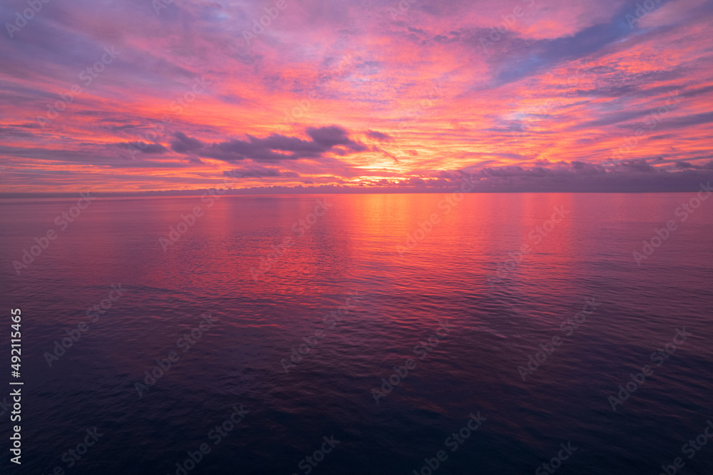 pink and yellow sunset over the ocean