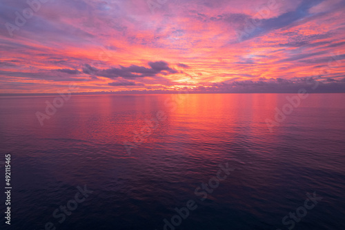 pink and yellow sunset over the ocean