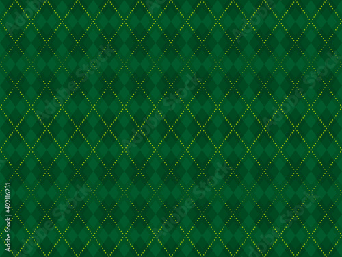 Green argyle pattern. Seamless geometric background. Green argyle pattern for fabric, textile, clothing.