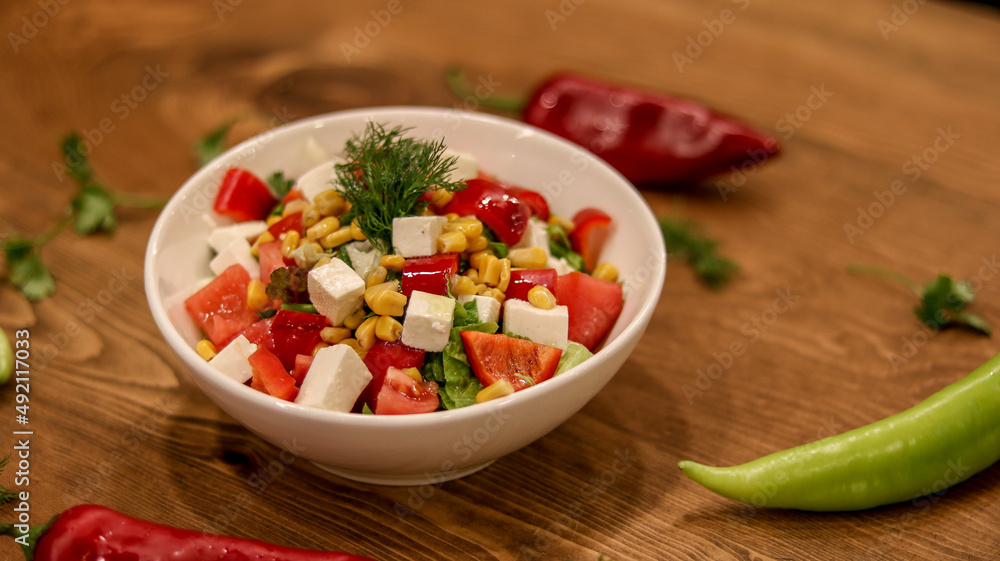 Professional product shot of salad plate on table Professional product shot of salad plate on table