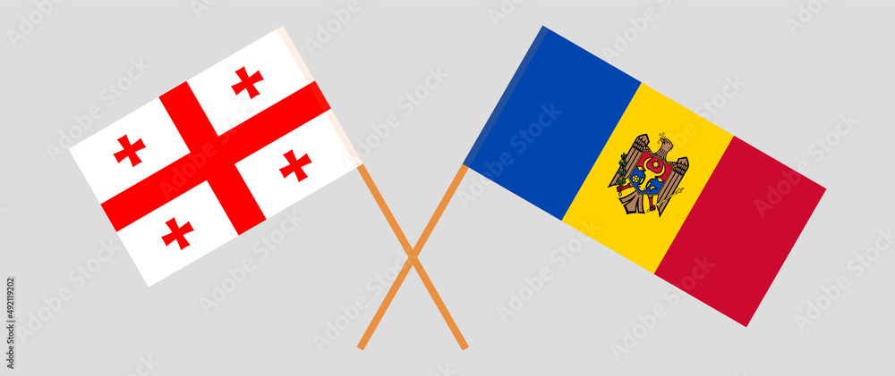 Crossed flags of Georgia and Moldova. Official colors. Correct proportion