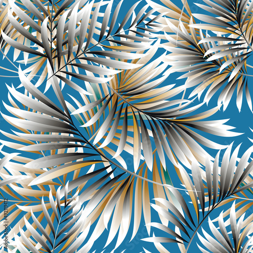 Palm. Seamless pattern with leaves of tropical plants. Vector image. © podtin