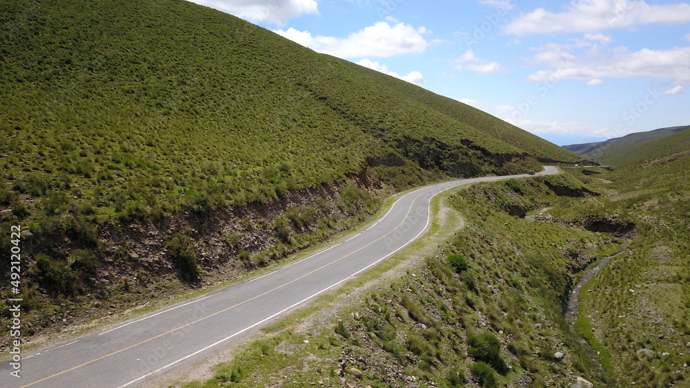 beautiful mountain road in green landscape in northwest Argentin