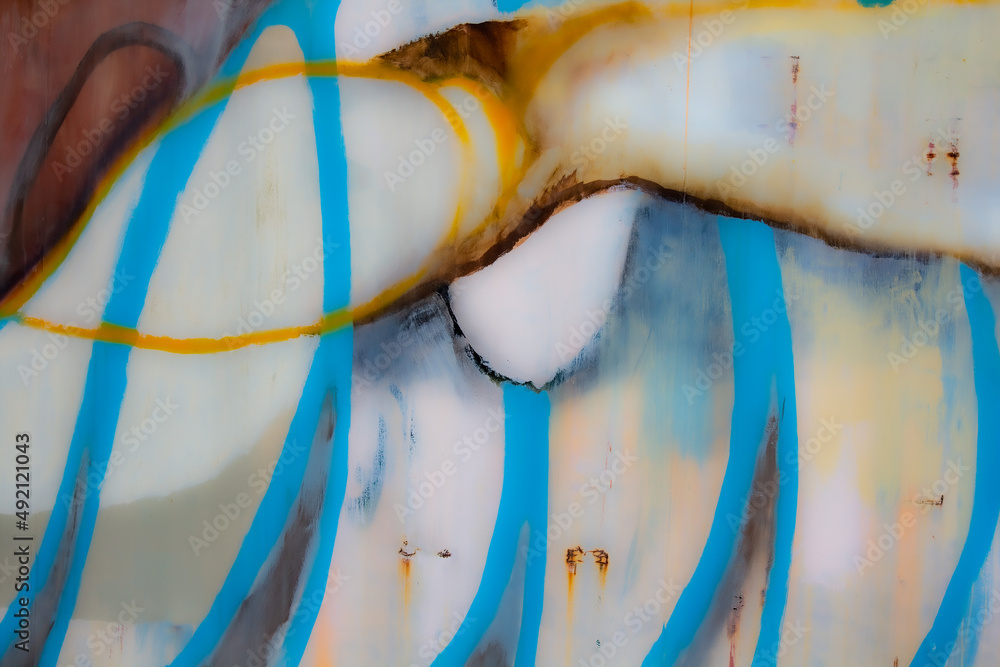Abstract image of a rusted painted outdoor wall. Blue and white painted graphic shapes and dripping rust. Abstract image of a rusted painted outdoor wall. Blue and white painted graphic shapes and dripping rust.