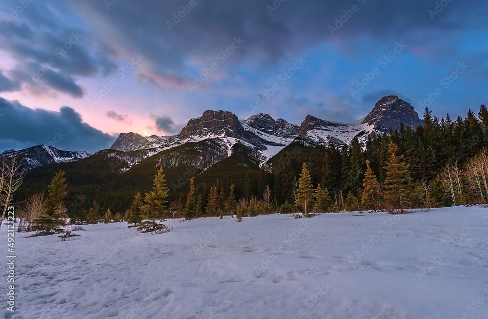 Winter Sunrise Over A Snowy Mountain Park