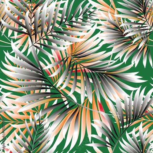 Palm. Seamless pattern with leaves of tropical plants. Vector image. 