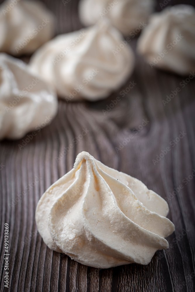 Delicious meringue cookies on the table. Delicious meringue cookies on the table.