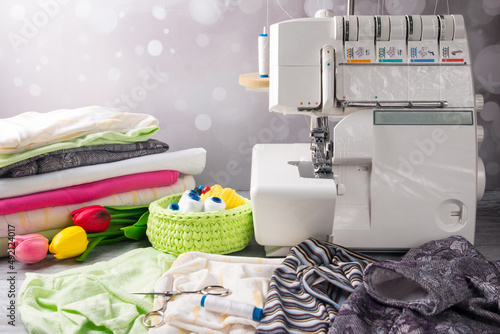 Overlock sewing machine and fabric stack. Tailor's Workflow photo