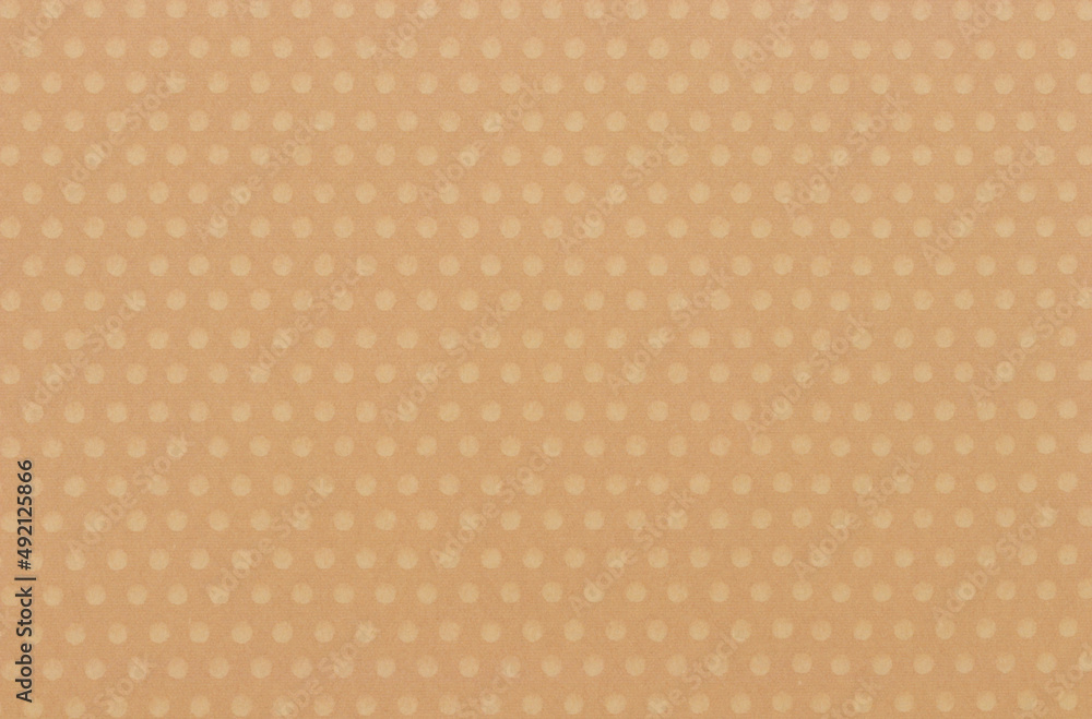 日本の紙　丸い模様のエンボス用紙　黄土色のデザインテクスチャ
Japanese paper, round pattern embossed paper, bright ocher design texture, Pumpkin
