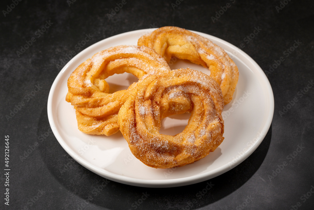 Sugared donuts on the table. Brazilian donuts. Sugared donuts on the table. Brazilian donuts.