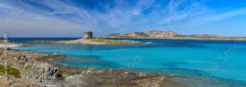 Beautiful panoramic view of Pelosa Beach (Spiaggia Della Pelosa). Stintino. La Pelosa beach, probably the most beautiful beach in Sardinia, Italy. Popular travel destination. Mediterranean seacoast.